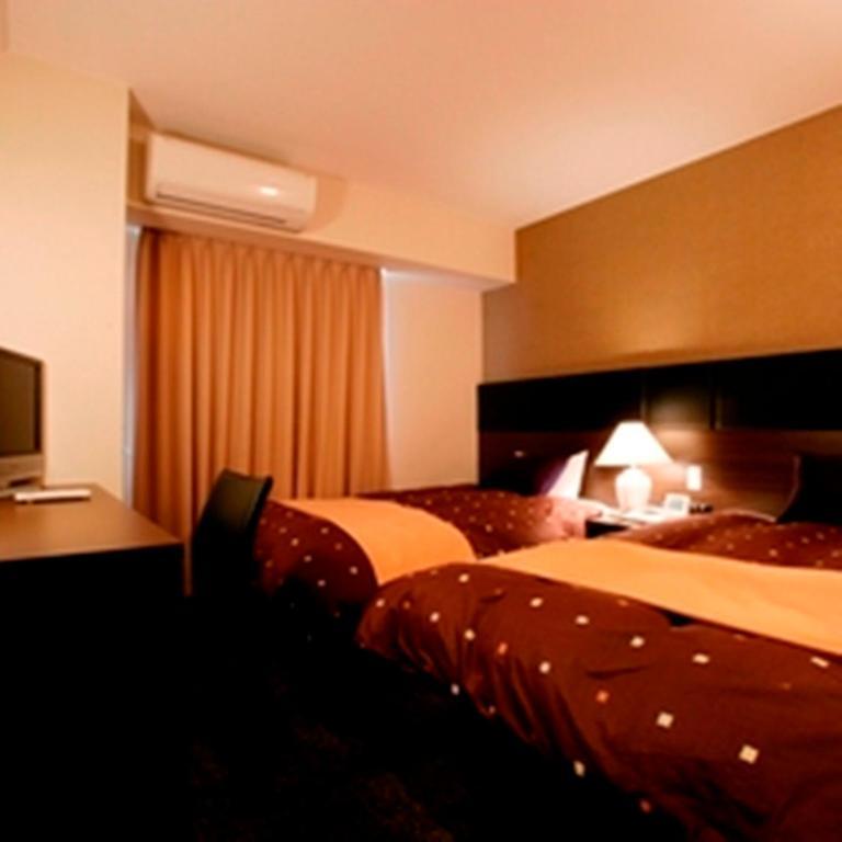 Hotel 1-2-3 Takaszaki Szoba fotó